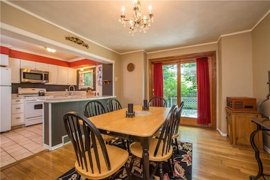 The dining room also has a hardwood floor. Garden 