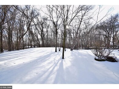 Huge yard is heavily treed and private.