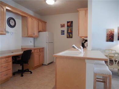 Maple kitchen with brushed nickel hardware and all