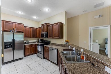 Beautiful, open kitchen with stainless appliances