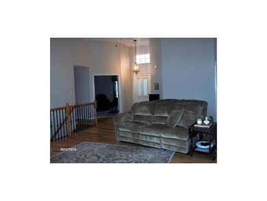 Entry has side light, window in door, and above do