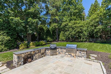 The lush landscaping and private rear yard make ou