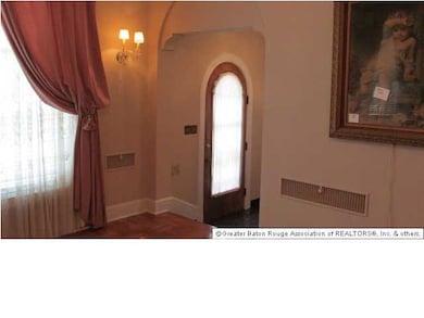 Solid wood arched front door with coat closet in f