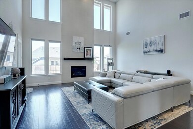 Soaring ceilings & floor to ceiling windows letting in natural light...