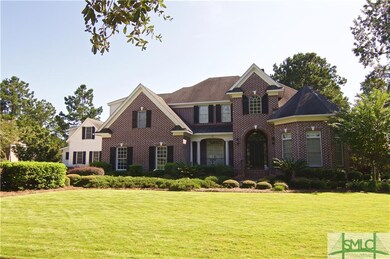 Guest cottage is the white house to the left.