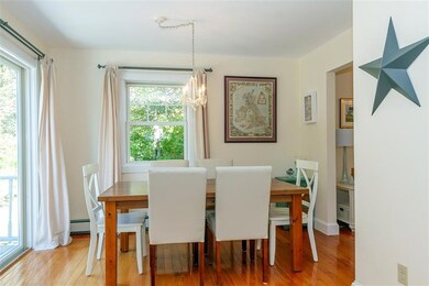 dining area w/ glass sliders leading...
