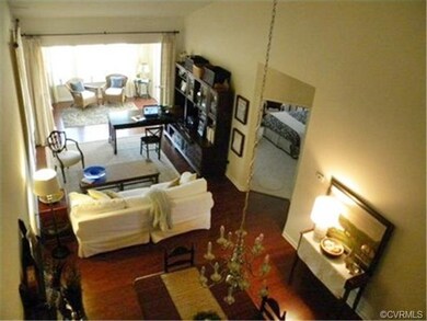 View of living area from upstairs loft
