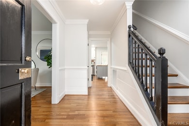 Gorgeous entry with shiplap, crown and chair rail