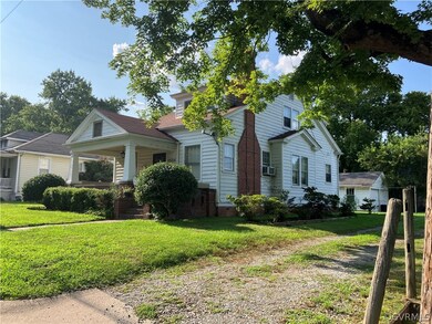 View of front of property with a front yard