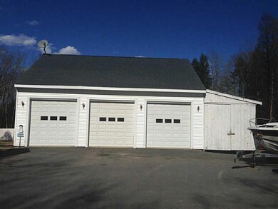 Exterior Front. Detached 3 car...