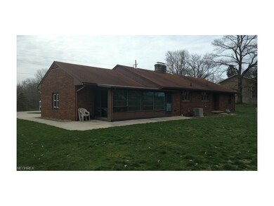 191 Trease - Rear view shows enclosed porch.