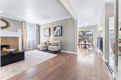 Formal living room showcasing a gorgeous fireplace.