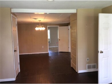 Wood floors. View looking from front door thru din