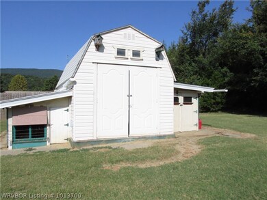 Storage Building/ Side storage for mower/ dog or cat kennel .