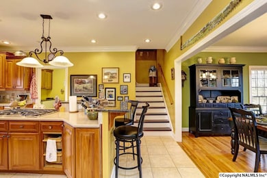 Here you'll find the heart of every home.....the kitchen.  The stairs you see in this view lead to the bonus room over the garage.