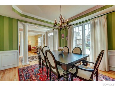 Another view of the dining room with oil rubbed br