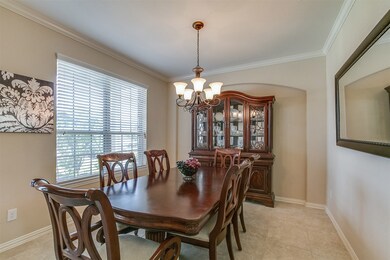 A large formal dining room off of the entrance with a buffet/china cabinet niche and lots of natural light!