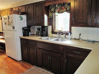 Nice hardwood floors. Plenty of cabinet and counte