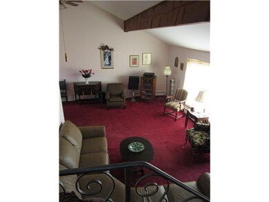 Living Room. Check out the beamed cathedral ceilin