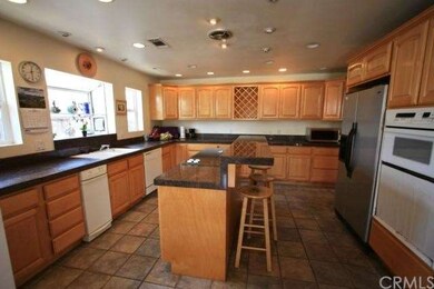 Remodeled kitchen with granite counter tops