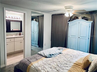 Master Bed leading into Master Bath