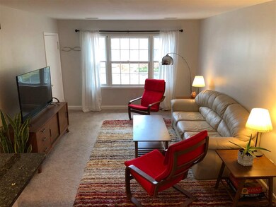 Living room with large window.