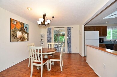 Formal dining room with updated floors/fixture and