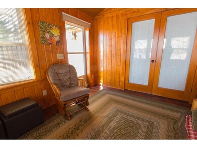 3 seasons porch with vaulted ceilings and hardwood