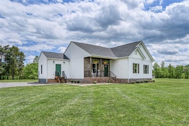 Modern farmhouse with a front lawn, crawl space, a