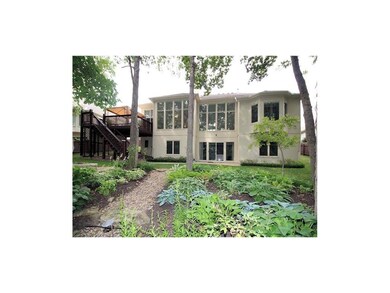 Treed backyard with deck from main level and patio