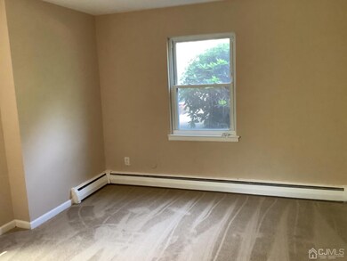 bedroom with newer carpet and freshly painted.