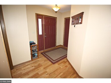 Beautiful hardwood floors welcome you into the hom