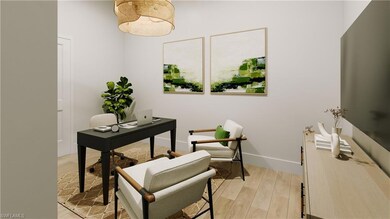 Home office featuring light hardwood / wood-style 