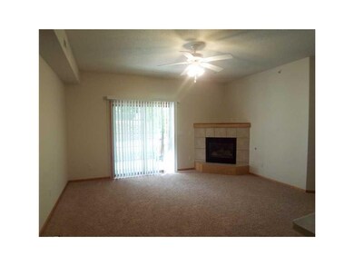 Living Room. Living room has new carpeting,a gas f