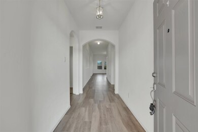 Corridor featuring light hardwood / wood-style flooring