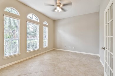 Just to your left of the foyer is the private study. Lots of light peek through these beautiful windows that face the quiet street of Buckthorn Drive.