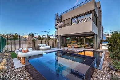 Rear view of property with stucco siding, a patio