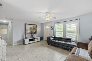Living room featuring light tile patterned floors 