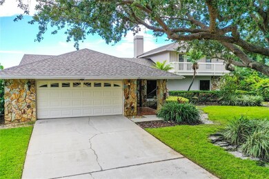 Stately Home with oversized driveway and rock acce