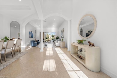 Foyer entrance featuring light tile patterned floo