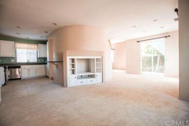 Family room open to kitchen with built-in entertai