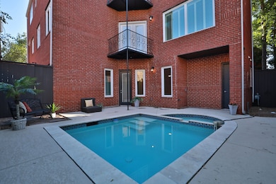 Nestled in a Prime Gated community, this beautiful 3-story residence is located in one of Houston's most sought after neighborhood and has a heated pool!