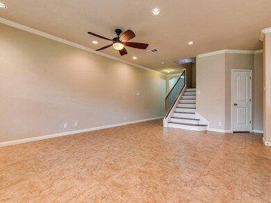 Spare room with a ceiling fan, recessed lighting,