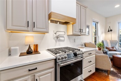 Kitchen featuring hardwood / wood-style flooring,