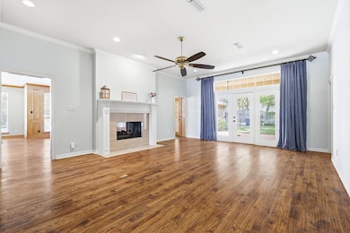 You can't miss the huge windows and doors that bring the outside in as you walk into the home.