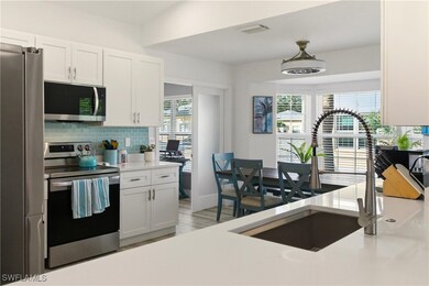 688 Wiggins Lake Dr unit 201, Naples, FL 34110 - photo 2