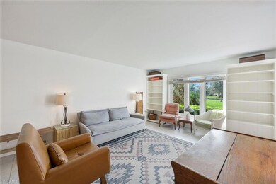 Enjoy lake views while relaxing in your living roo