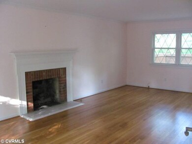 Living Room - Brick Wood Burning Fireplace