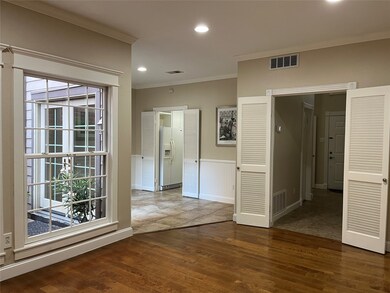 The front door is shown in the background. We are