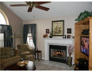 Living Room. Cozy livingroom surrounds gas log fir